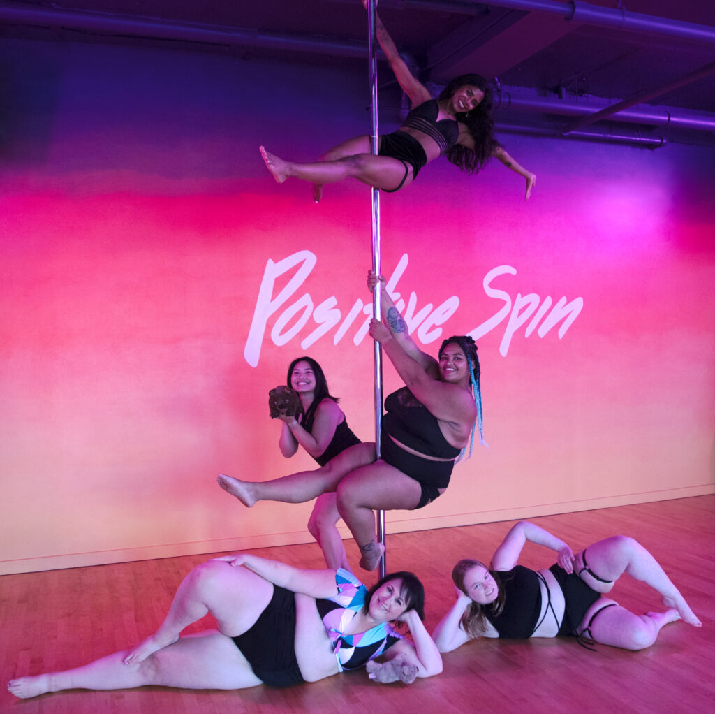 Several pole dancing at a studio in Seattle